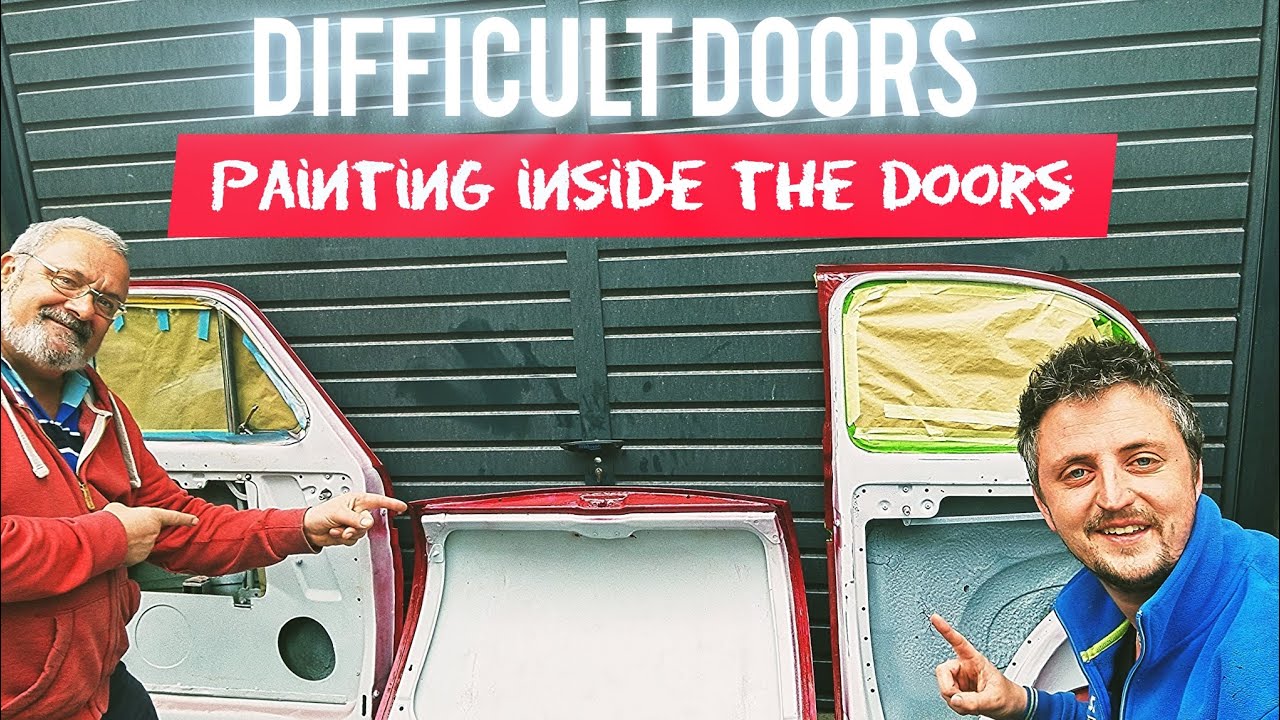 Painting all the difficult parts of the doors on an Austin a30 1956
