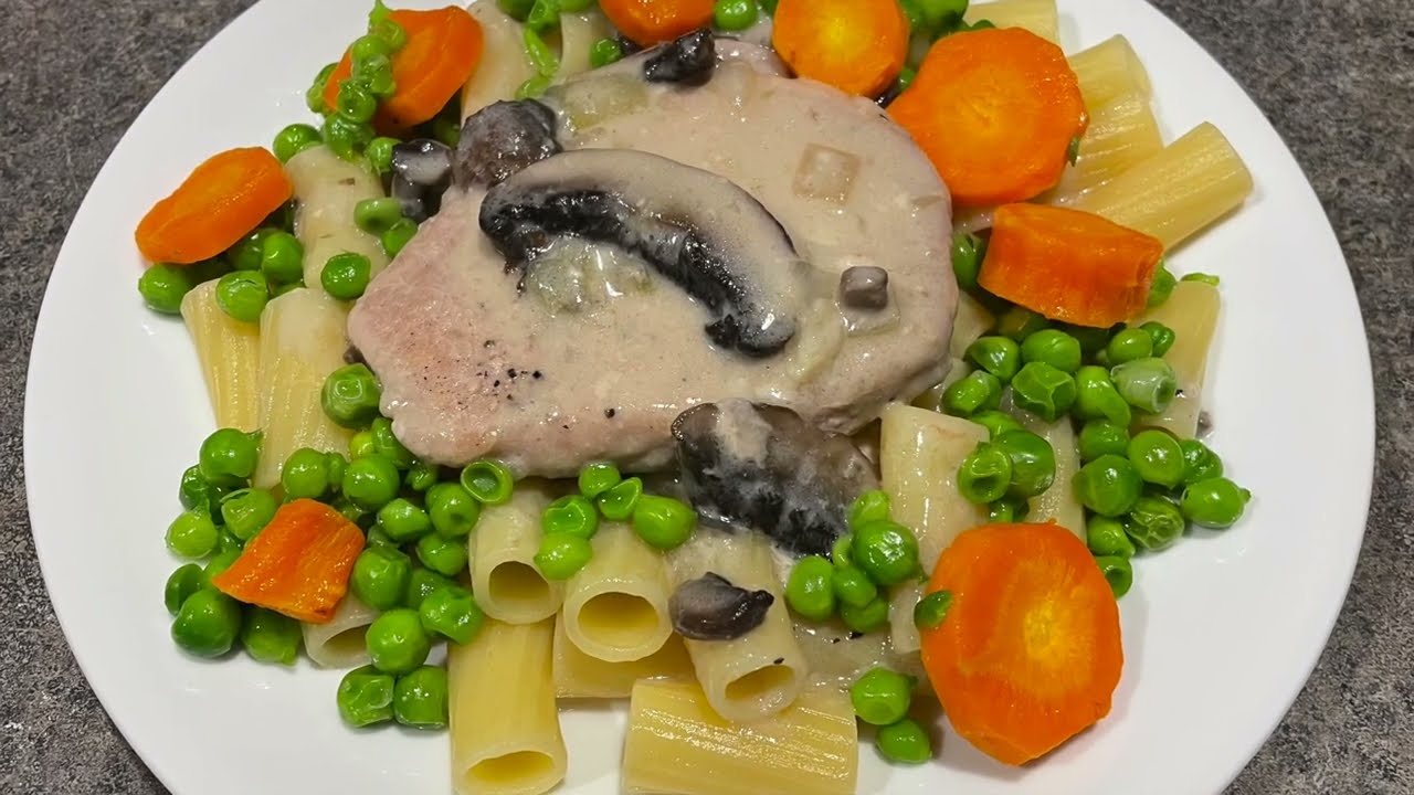 Pork Chops Baked In Mushroom Soup.