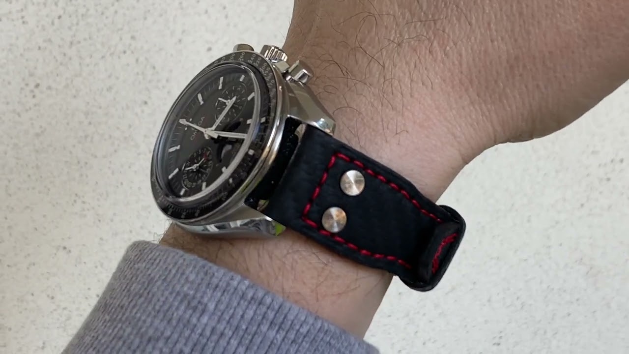 OMEGA Speedmaster Moonphase 44,25mm with riveted pilot strap
