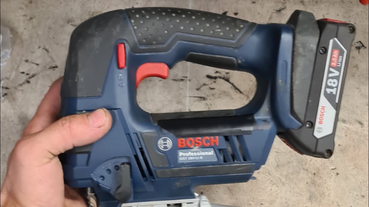 Repairing a Bosch GST 18V-LI jigsaw tool with a broken tool holder.