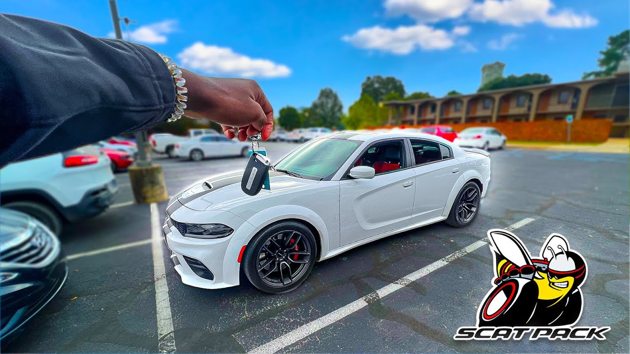 I BOUGHT A 2021 WIDEBODY SCATPACK CHARGER AT 20! 💨*INSANE RED SEATS*🚗