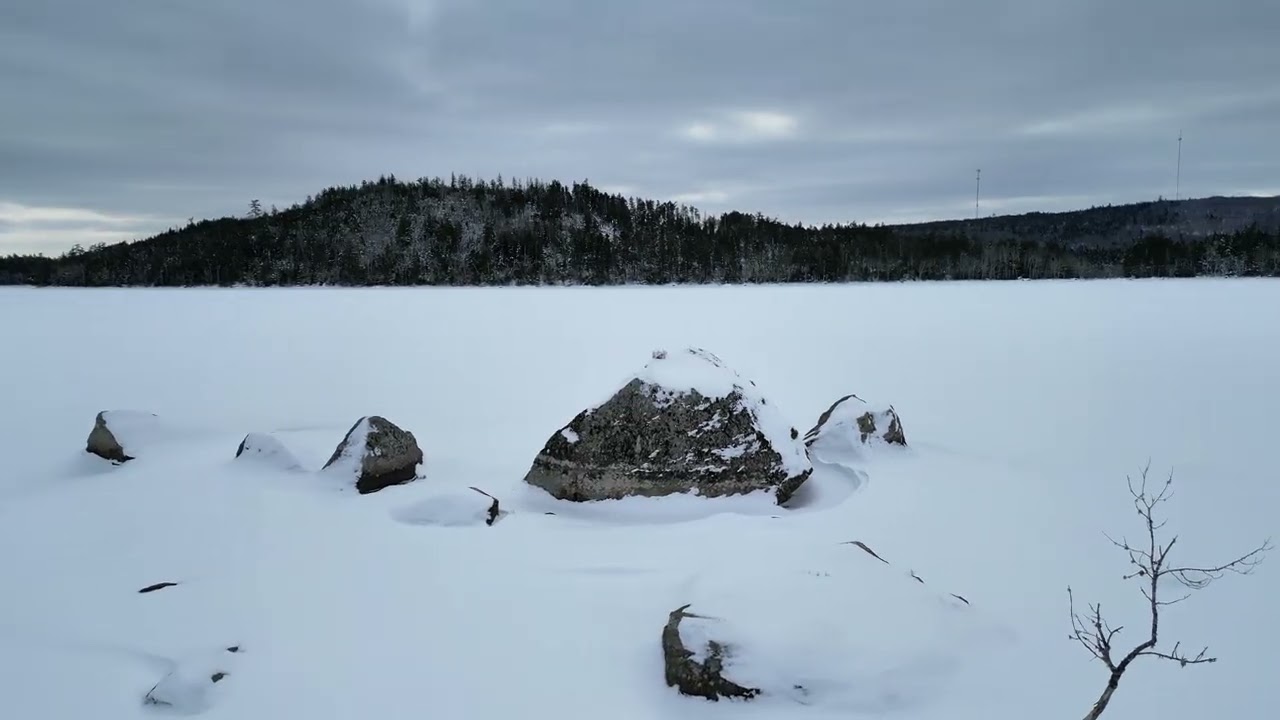 Snow Covered Lake and Wilderness Views Along the Musquodoboit Trailway in Winter - Cinematic 4K