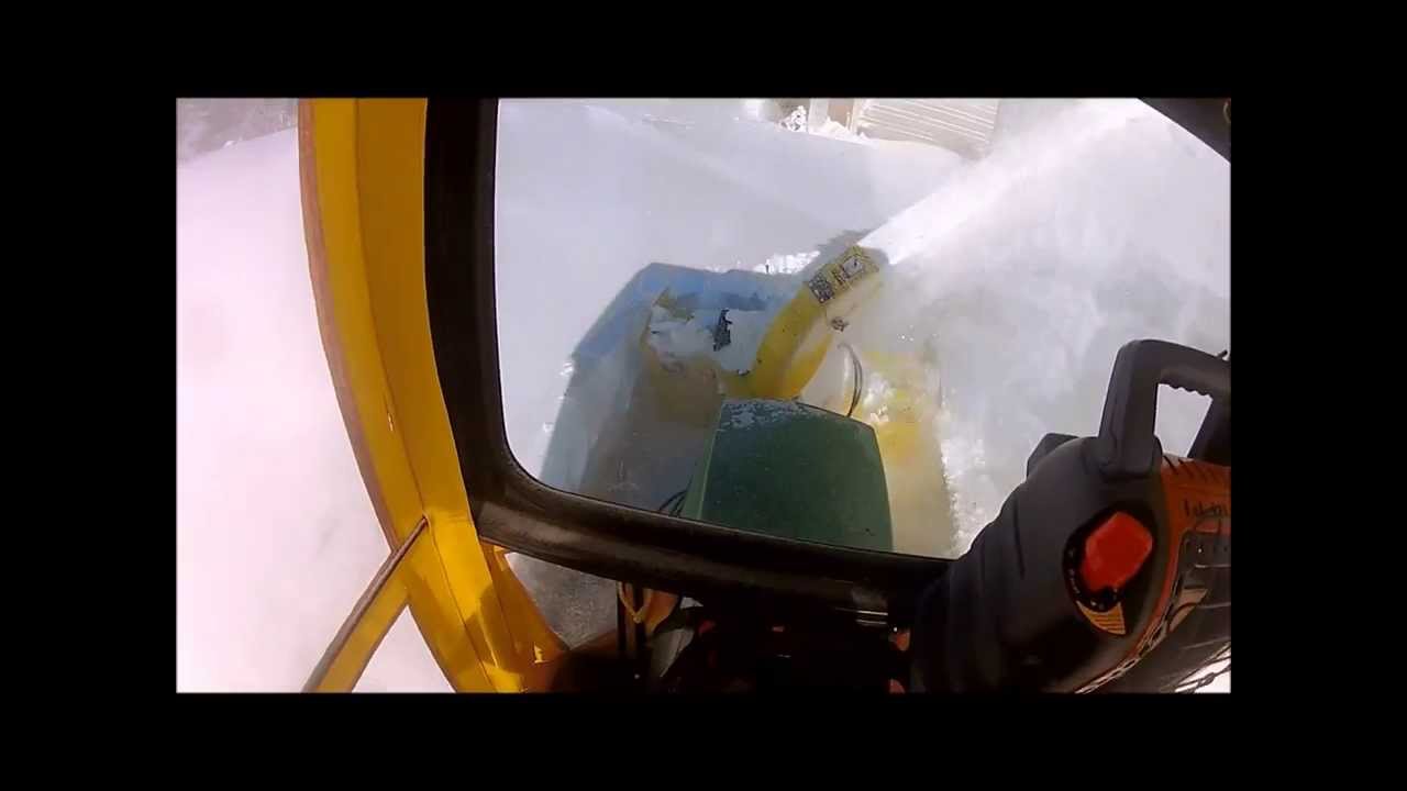 John Deere 455 With Cab Blowing Deep Snow. 47 Inch Two Stage With X Series Mount.