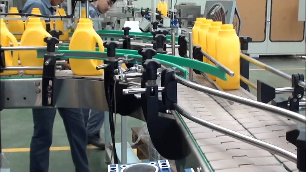 SMC Product Conveyor with Bottle Rotation and Leak Tester