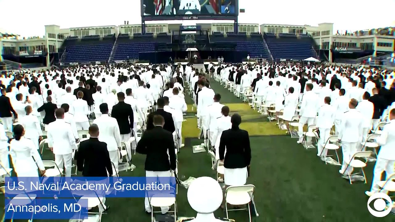 WEB EXTRA: US Naval Academy Graduates Toss Caps In The Air