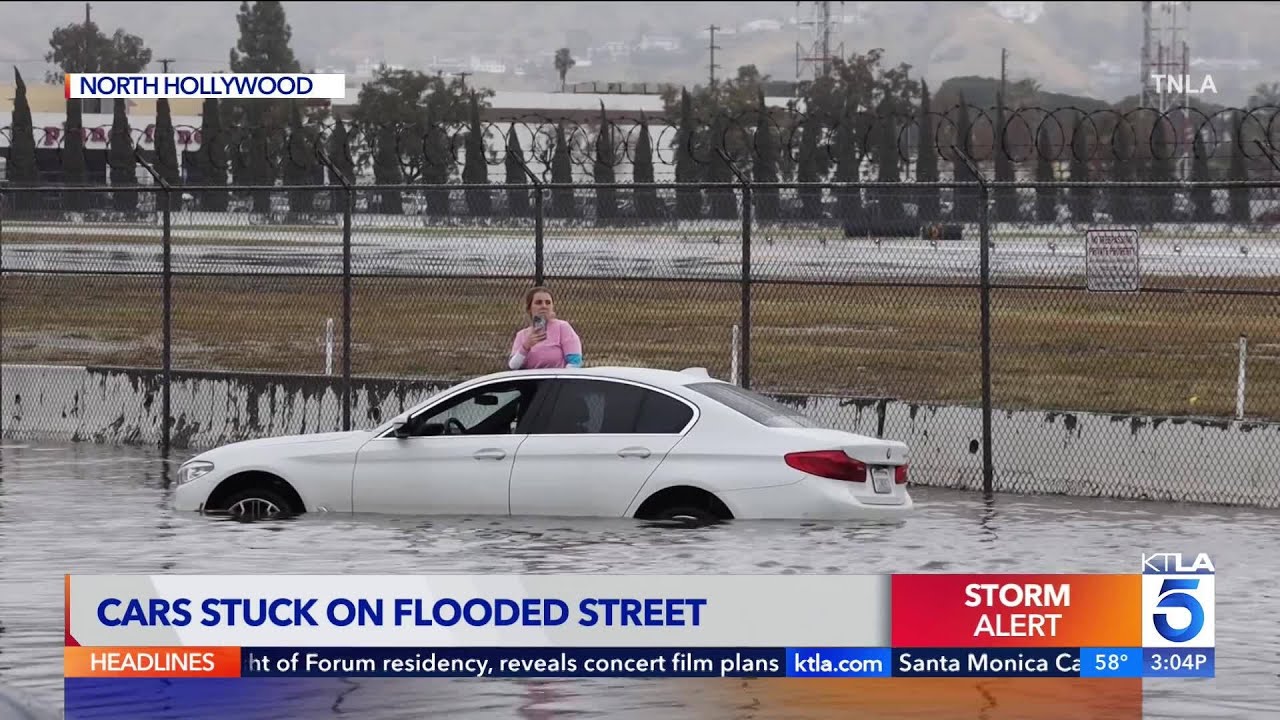 Cars stuck on flooded street in North Hollywood