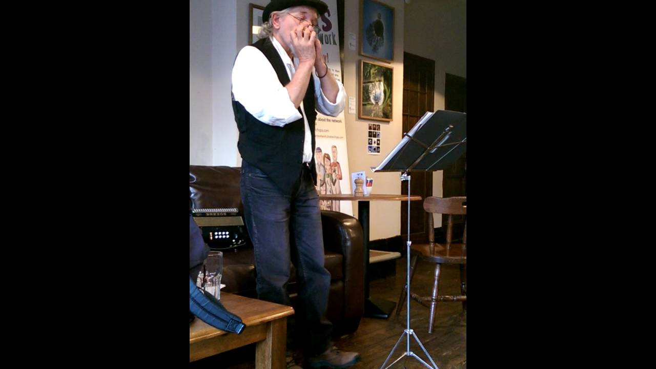 Dave Reeves performs his 'Haiku Blues' at Park's cafe during Droitwich Arts Week, 23/05/2016