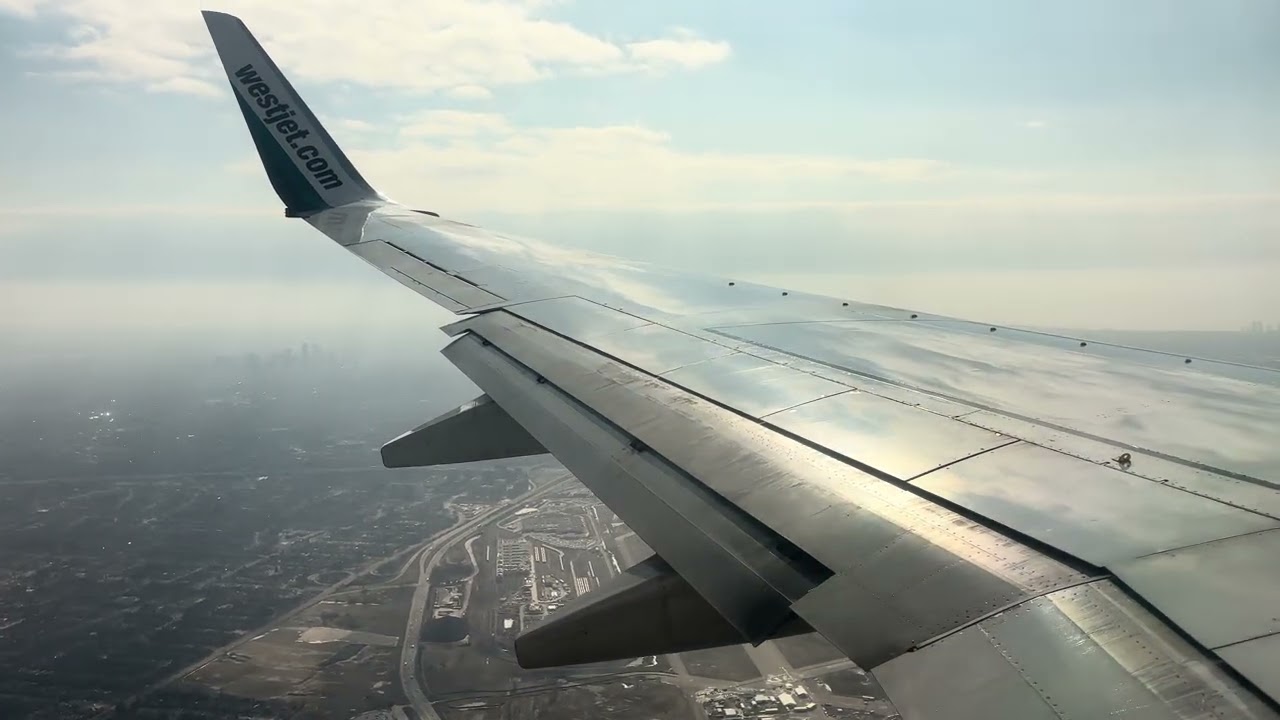 WestJet 737-700 Landing at Toronto Pearson YYZ Runway 24L 