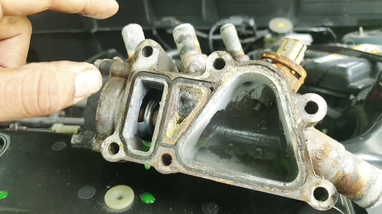 Cambio de caja porta termostato y junta de tapa de valvulas FORD ECOSPORT ZETEC ROCAM 1.6