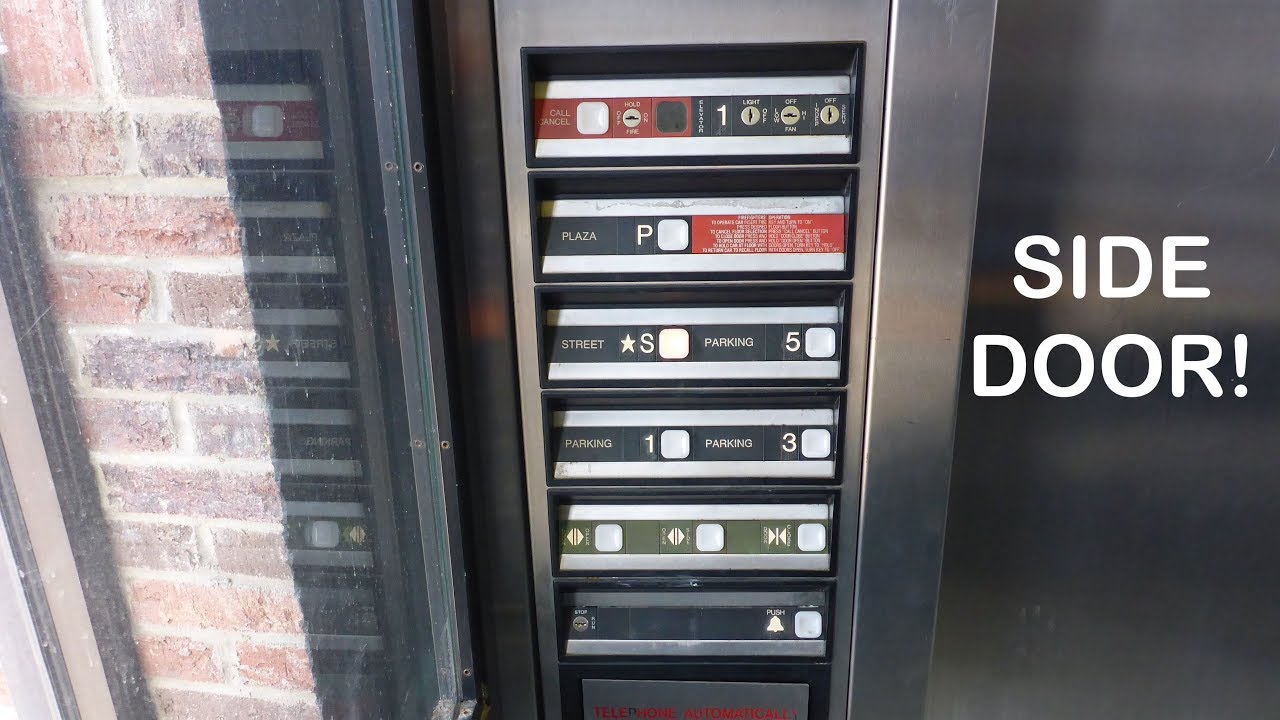 Interesting 1993 Dover Impulse elevator with a side door in a parking deck Chapel Hill NC