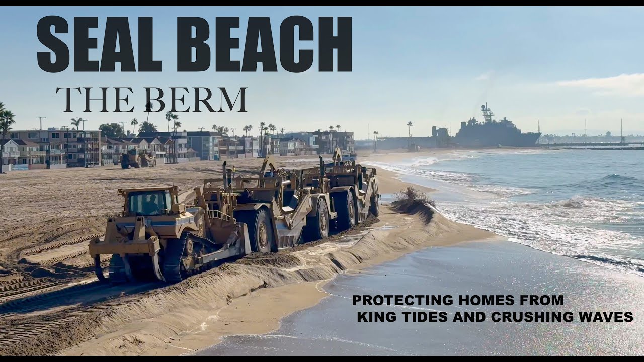 BUILDING A SAND BERM AT SEAL BEACH TO PREVENT FLOODING