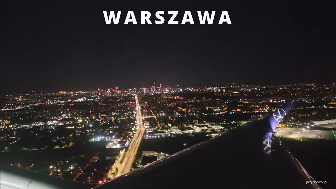 Warszawa / Warsaw Nocny start z Lotniska Chopina z widokiem na wieżowce take off from Chopin Airport