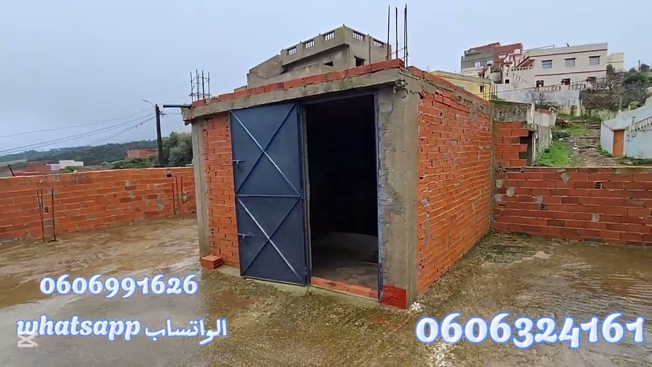 كراج مقسوم نص سكنة ونص كراج 100متر ملكية واصلا الماء والضوء والطريق في الرمان نواحي طنجة 