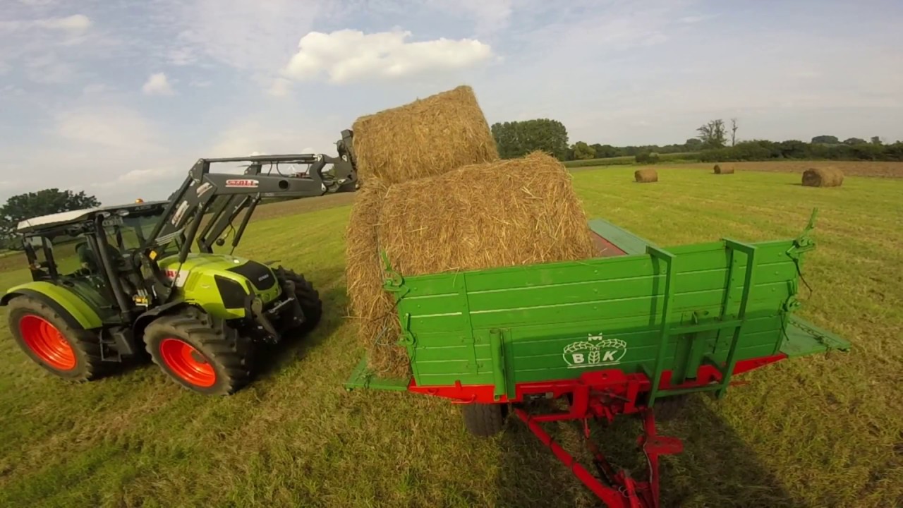 Ballen fahren mit Claas Axos 310 und Stoll ecoline FE 950p und IHC 633 mit Krone Emsland