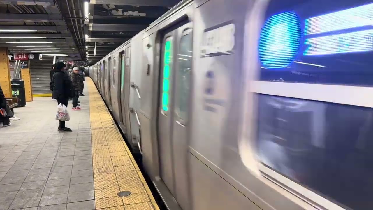 IND Eight Avenue Line: A/C/E trains at 14th street with an Ad-Wrapped R160