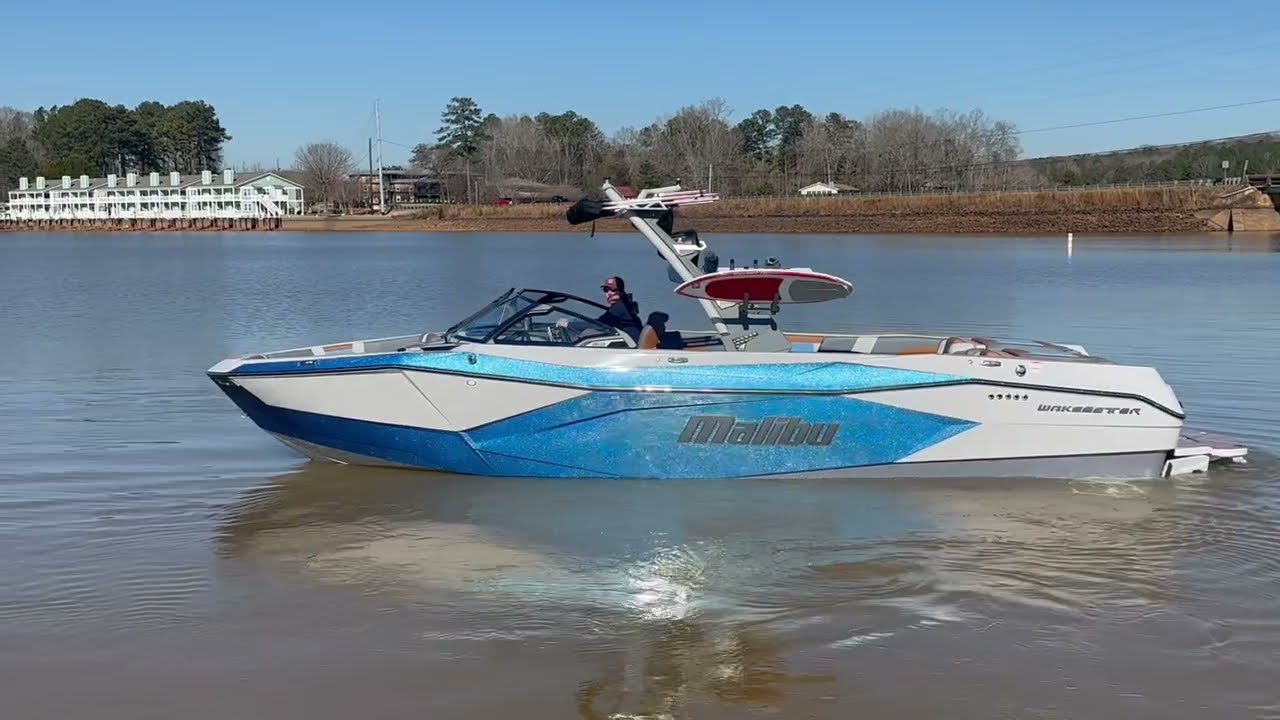 Wakeboarding and Surfing behind the 2024 Malibu 26 LSV