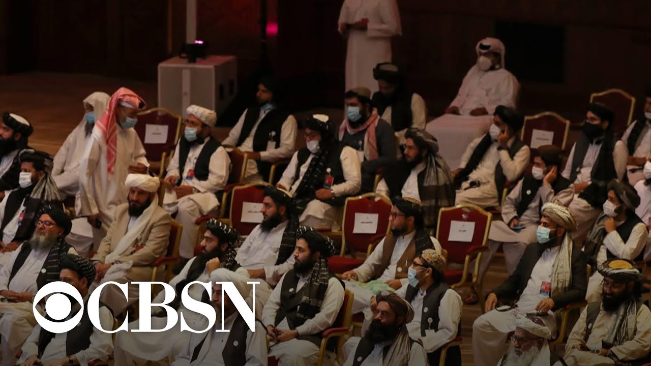 Afghan and Taliban leaders hold first direct meeting as historic peace talks get underway