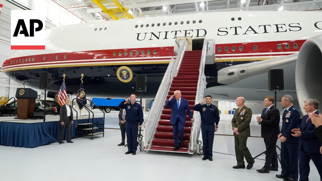 Trump unveils new Air Force One, says ships are 'pouring out' Strait of Hormuz