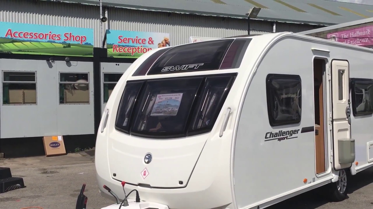 Swift Challenger Sport 554 2012 fixed bed rear washroom touring caravan for sale £12250on the road.