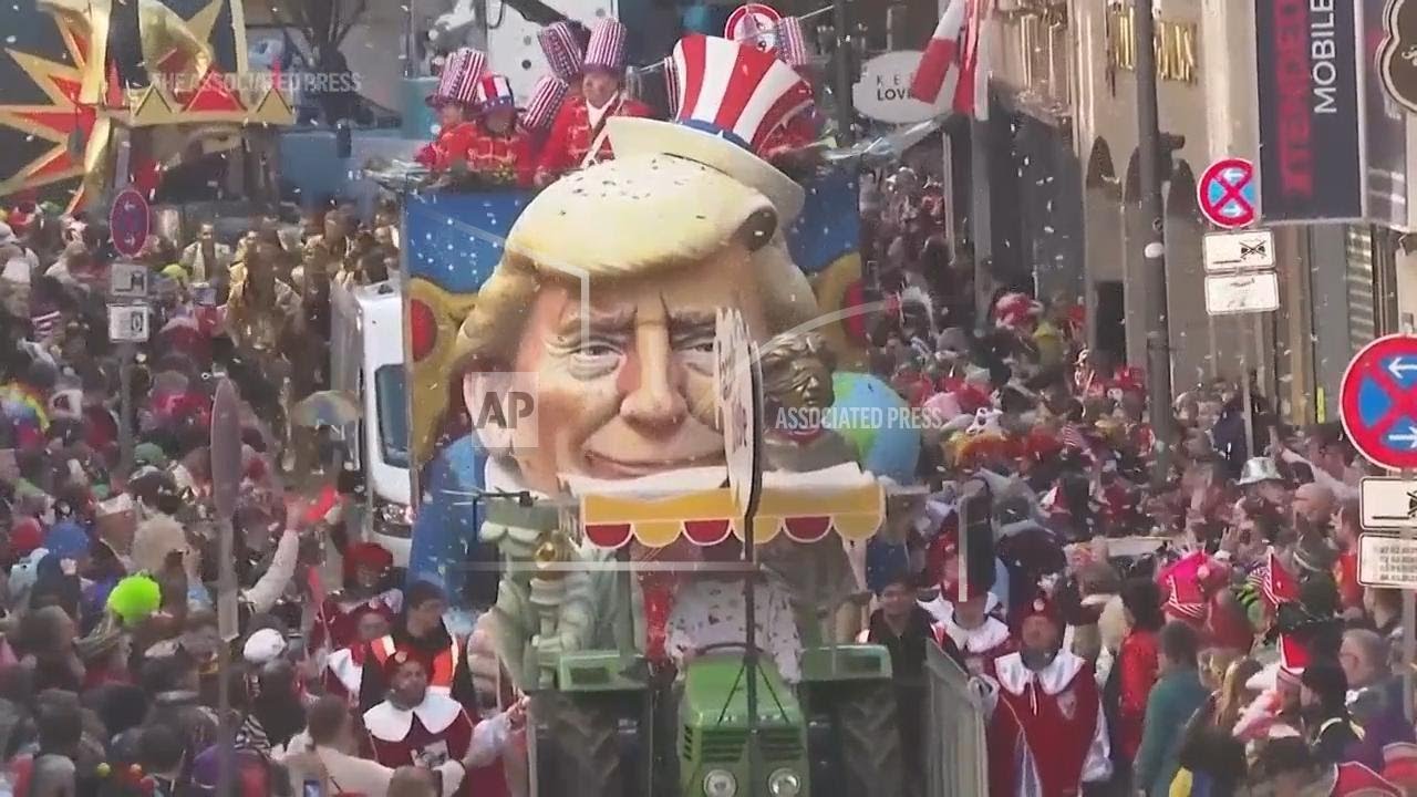 Cologne's colourful Rose Monday Carnival parade pokes fun at political figures