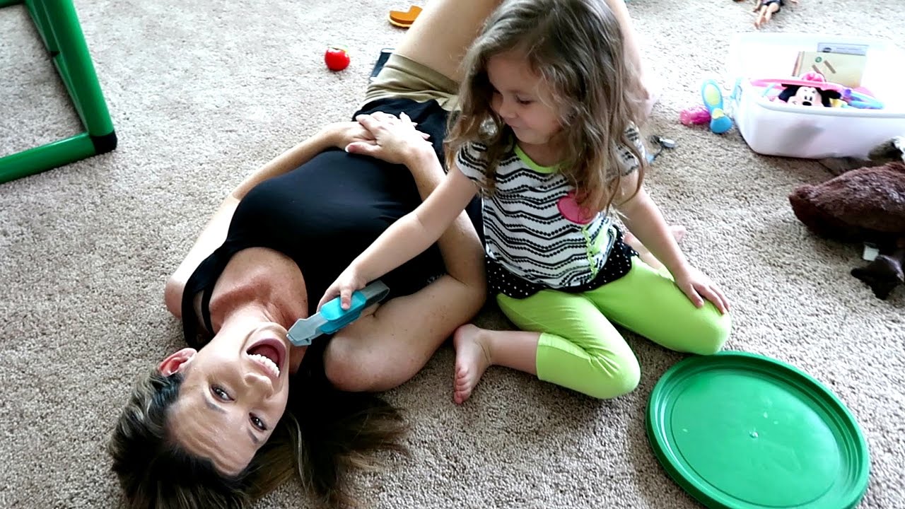 PLAYING DENTIST PULLING MOMMY'S TEETH OUT