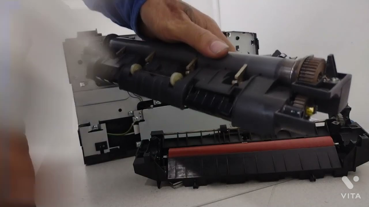 como desmontar fusora de kyocera p2135