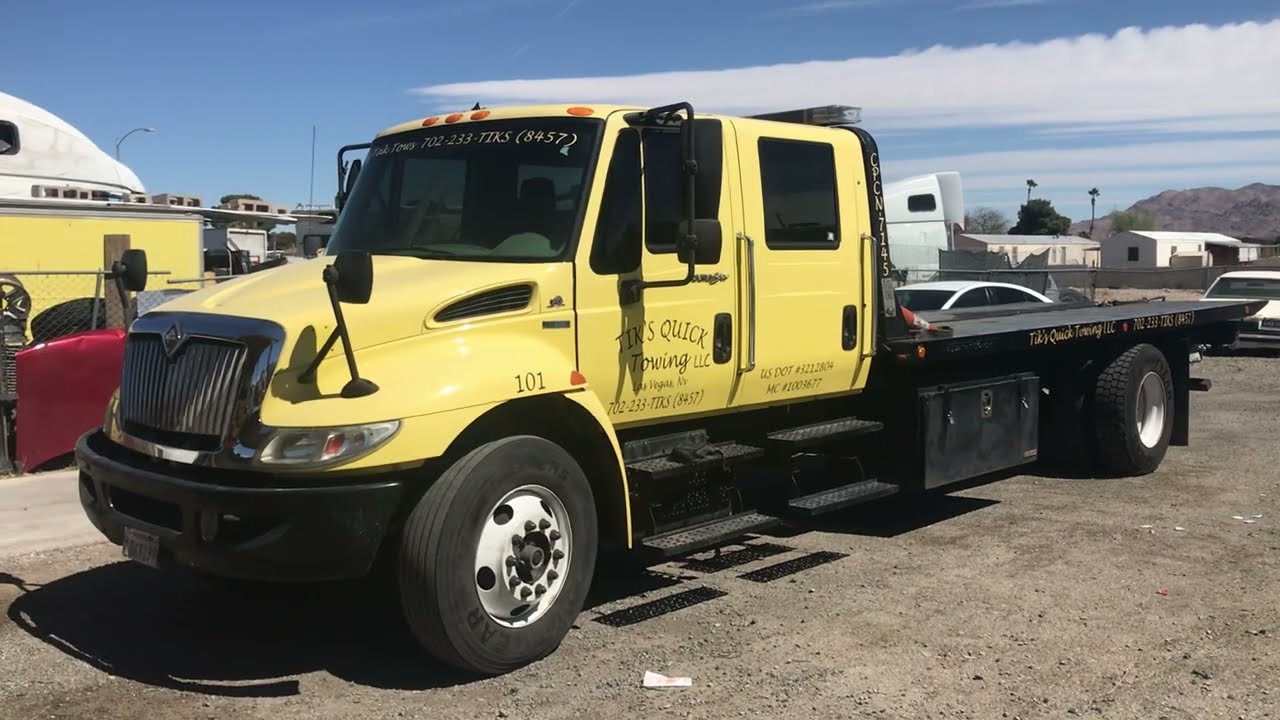 2010 International 4000 Crew Cab Flatbed Tow Truck