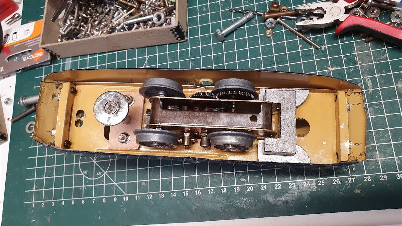 Electric motor, dent repair & homemade pickup shoe for the O scale Hornby PLM Autorail railcar
