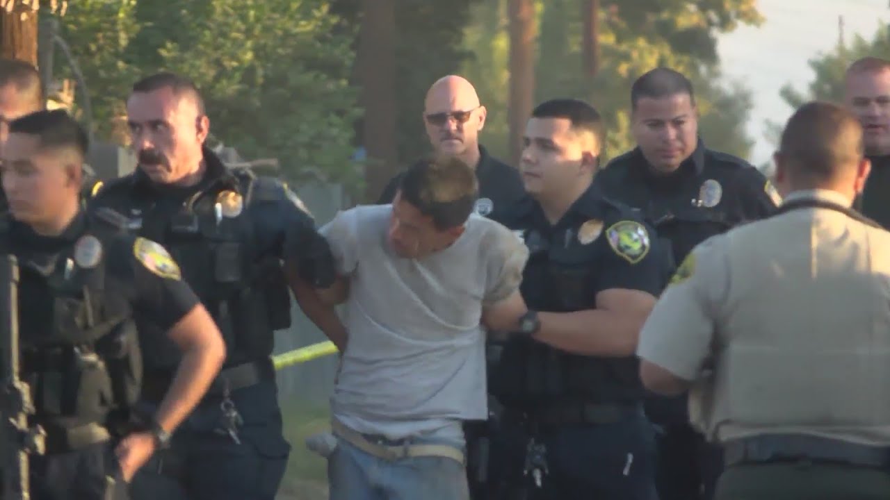 Officer mistakenly shoots armed homeowner while chasing burglary suspect in Reedley neighborhood, de
