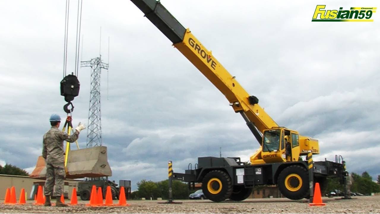 Crane Grove RT650E Moving Concrete Road Barriers In Crane Operator Training