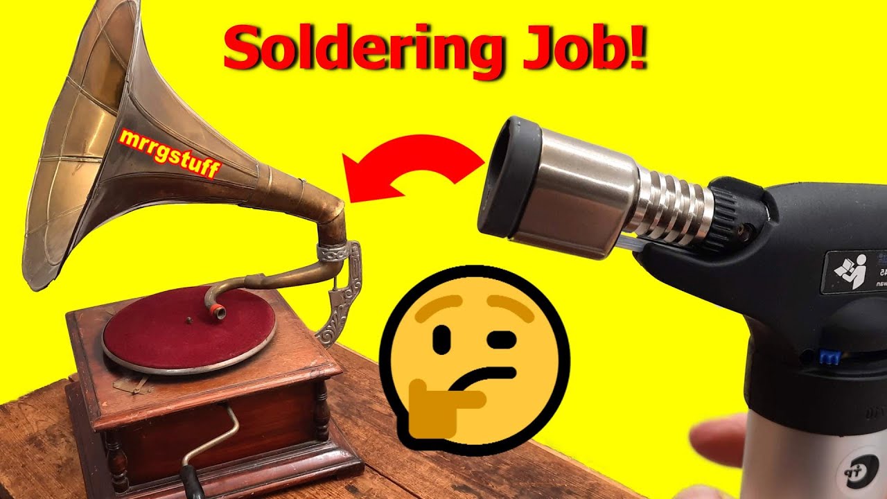 Soldering a fake gramophone horn with a blowtorch