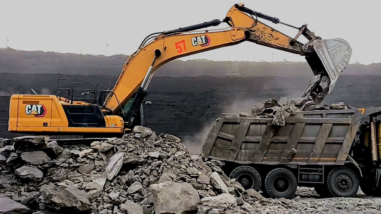 Next-gen Cat 345 Excavator Loading Coal From || Volvo truck