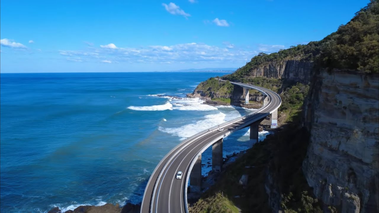 Flying Over Sea Cliff Bridge Sydney | 4K DJI Drone Cinematic