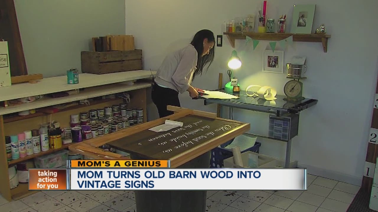 Mom turning old barn wood into vintage signs