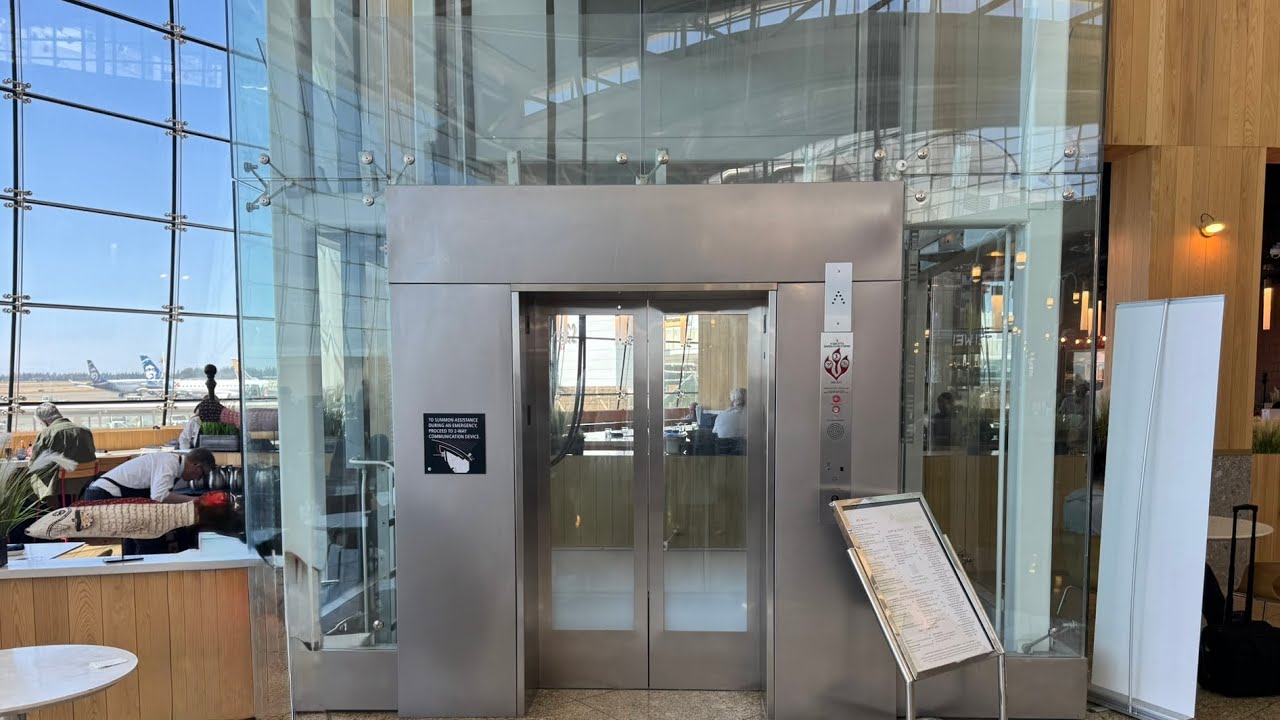 Glass KONE Traction Elevator in the Seattle-Tacoma International Airport Main Terminal Atrium