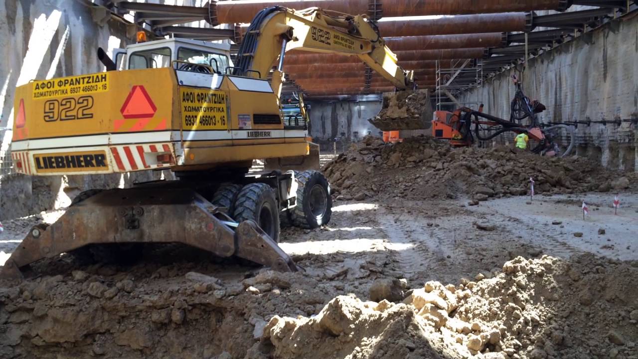 Liebherr 922 Excavator Digging At Metro Station