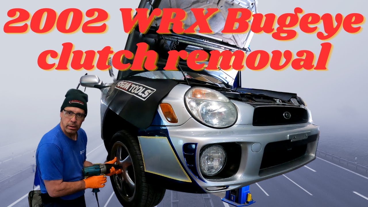 2002 Subaru WRX Bugeye clutch removal.  Super stuck bell housing to engine!!