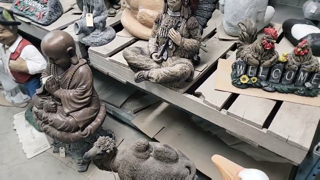 015 - Visiting the concrete statue business.