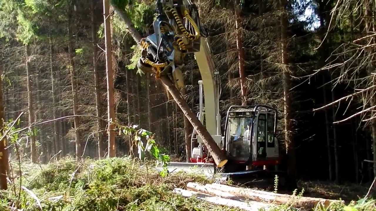 Cap procesor Kesla 20RH montat pe excavator Takeuchi TB1140