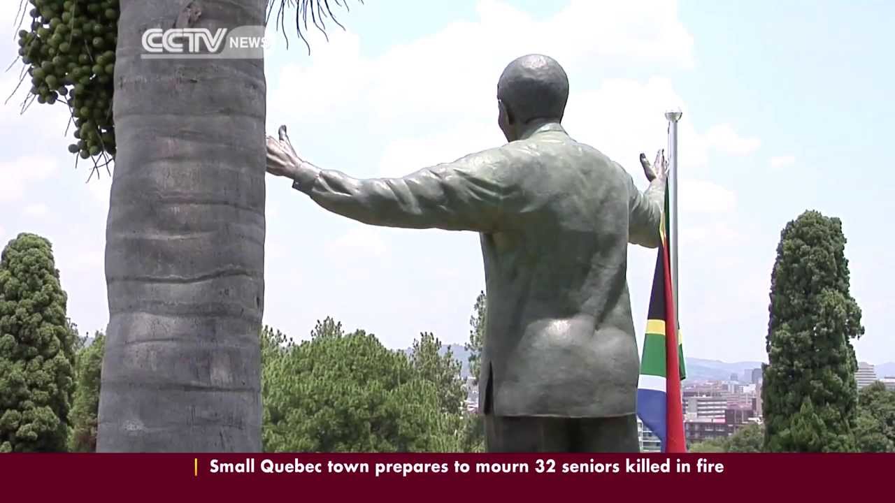 Mandela Statue: Sculptors criticized for leaving quirky signature on bronze work