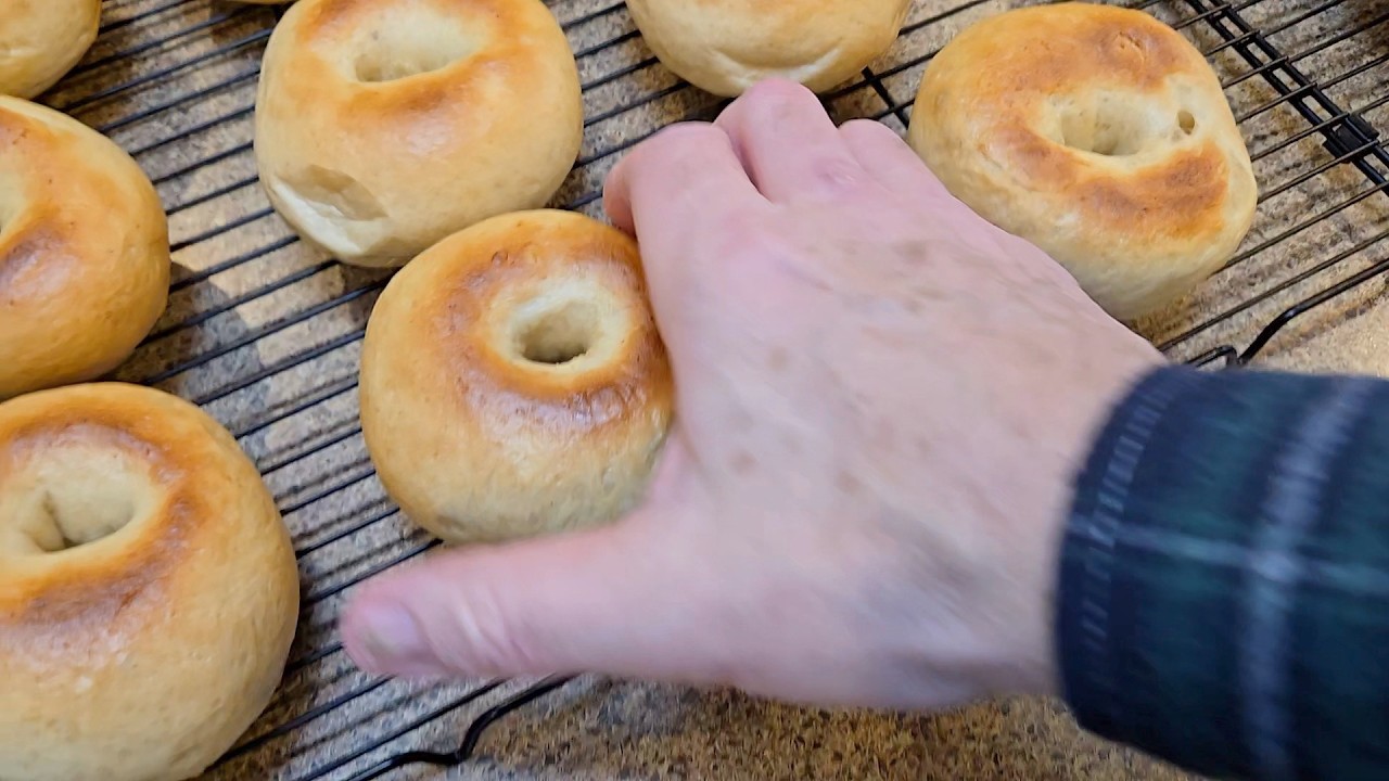 Homemade crispy bagels - shaping, boiling and baking.