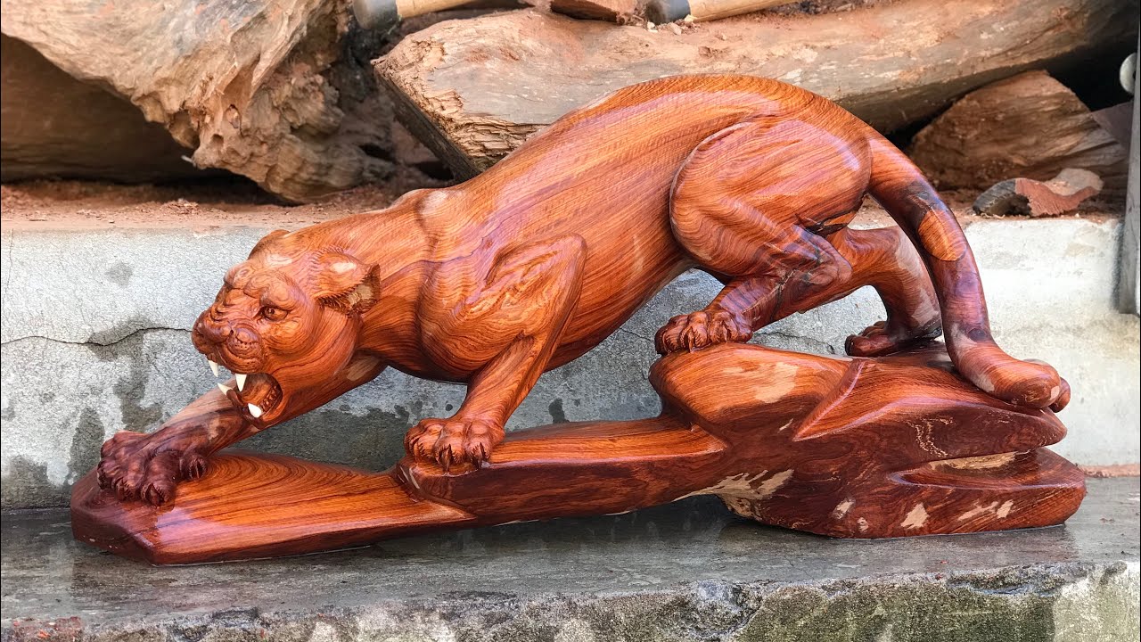 Great leopard wood carvings | TUAN WOOD CARVINGS