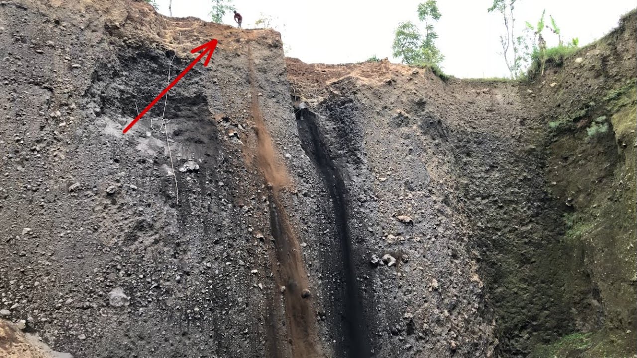 excavation begins from the top of the cliff