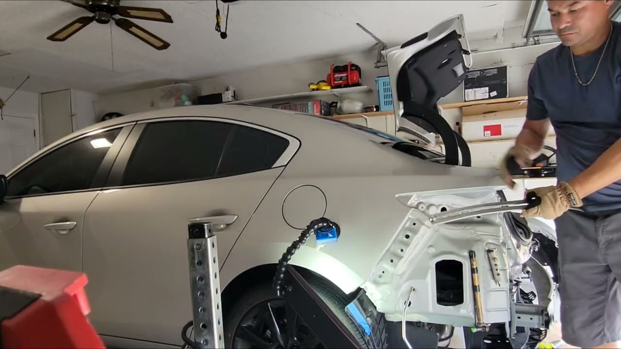 PAINTLESS DENT REPAIR ON 6 MONTHS OLD MAZDA 3 QUARTER PANEL!