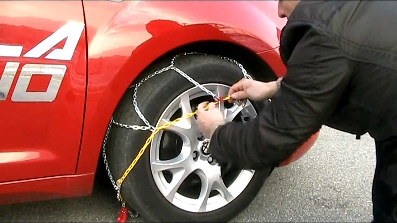 Autoscuola luino - montaggio catene da neve -
