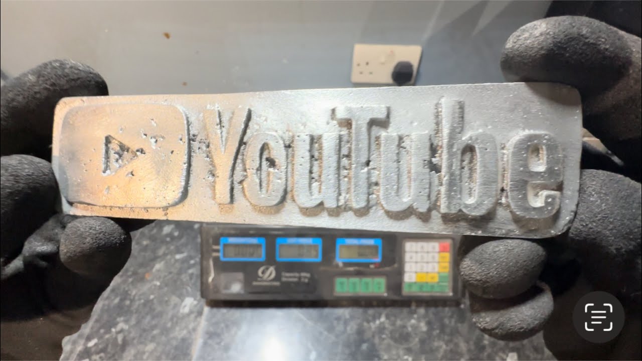 Melting aluminium - sand casting a YouTube sign