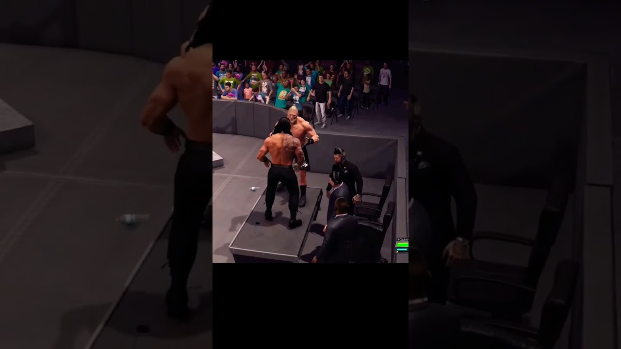 BROCK PUTS F5 TO ROMAN ON TABLE  
