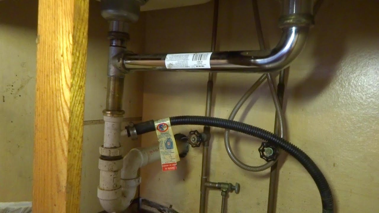 KITCHEN SINK DRAIN LEAKING BADLY