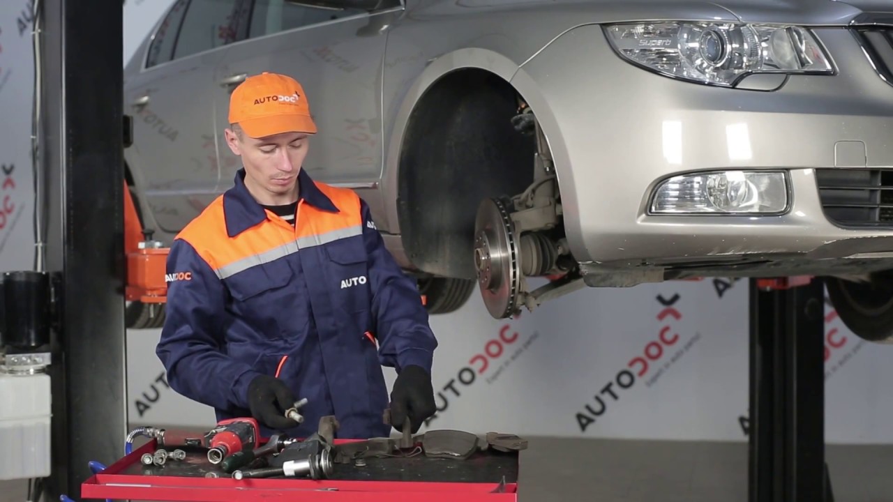How to change front brake discs and front brake pads on SKODA SUPERB 2 TUTORIAL | AUTODOC
