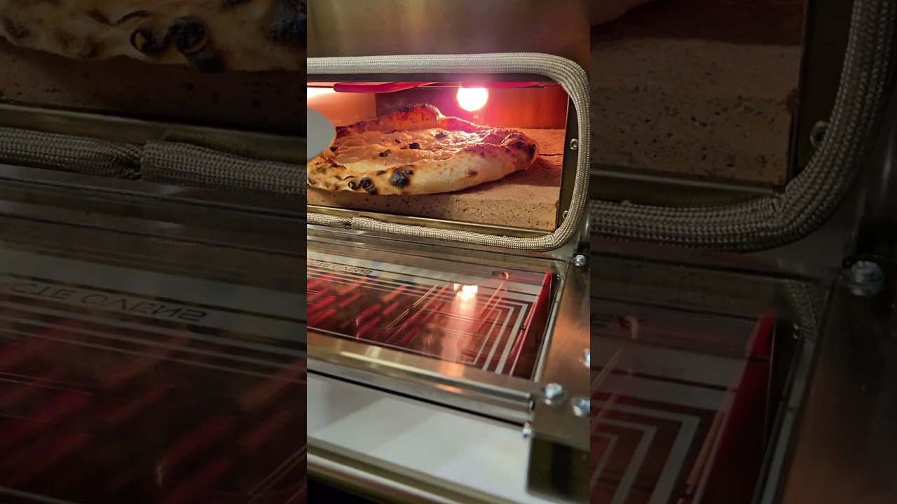 Pizza napoletana - mortadella and pistachio baked in the macte ovens voyager smart for 100 seconds